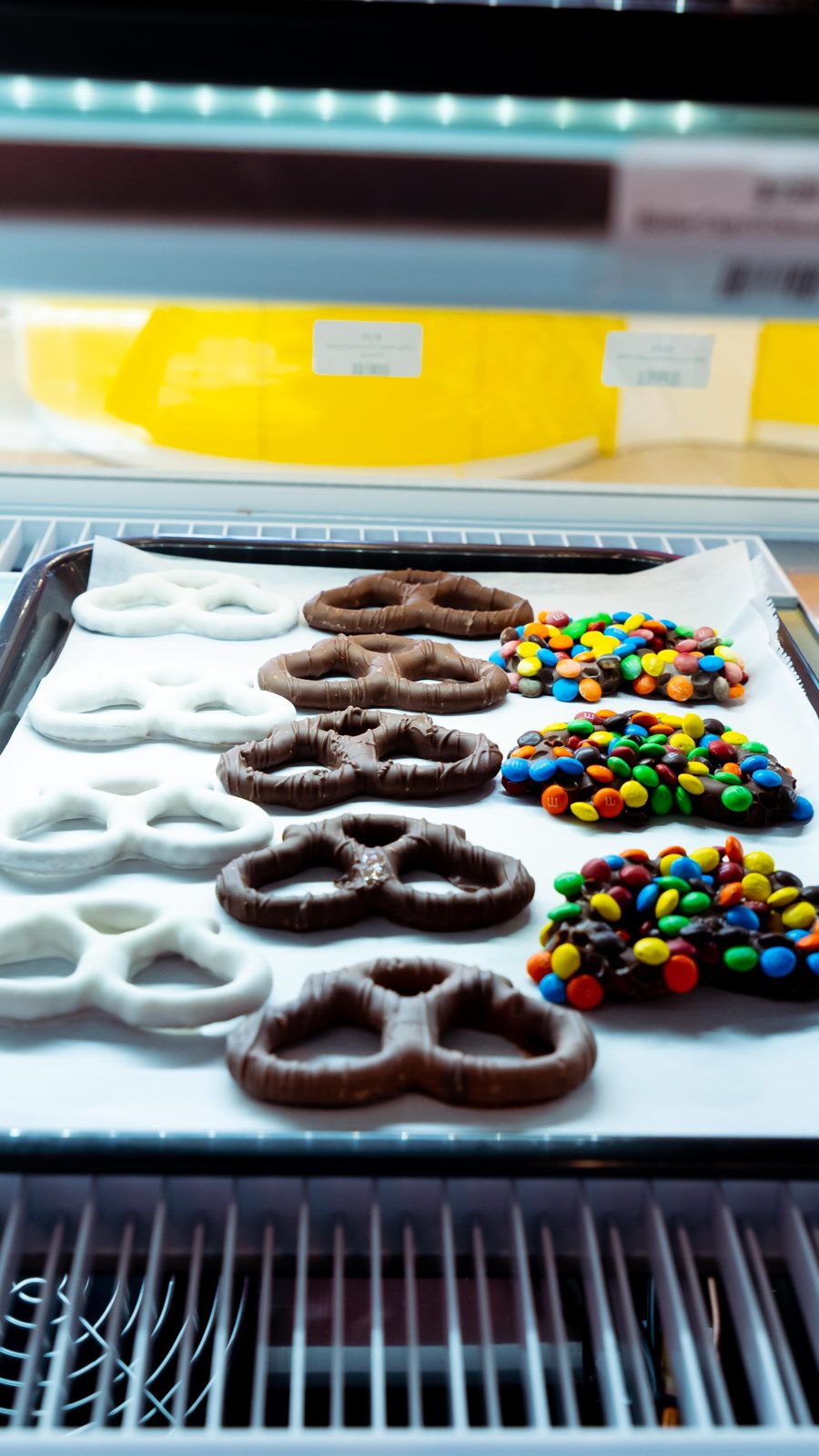 White and dark chocolate covered pretzels with rainbow candies